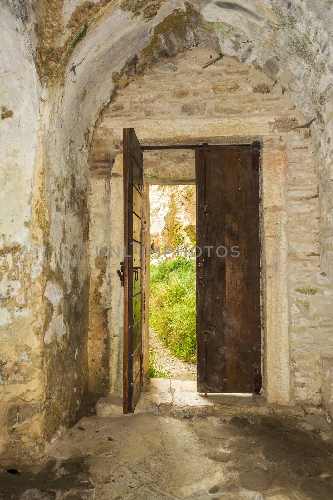 Entrance of the monastery enclosed by Davelis cave in Penteli, a mountain to the north of Athens, Greece.