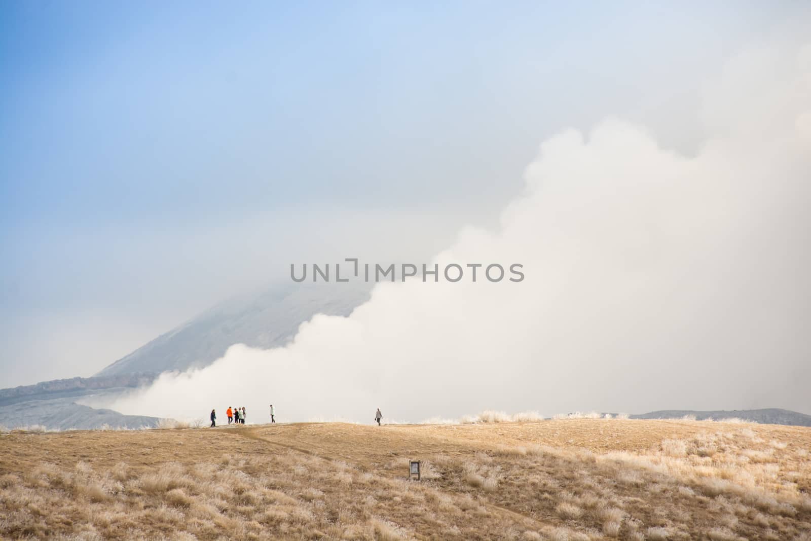 Mount Aso and Kusasenri in winter. covered by golden yellow grassland - Kumamoto, Japan