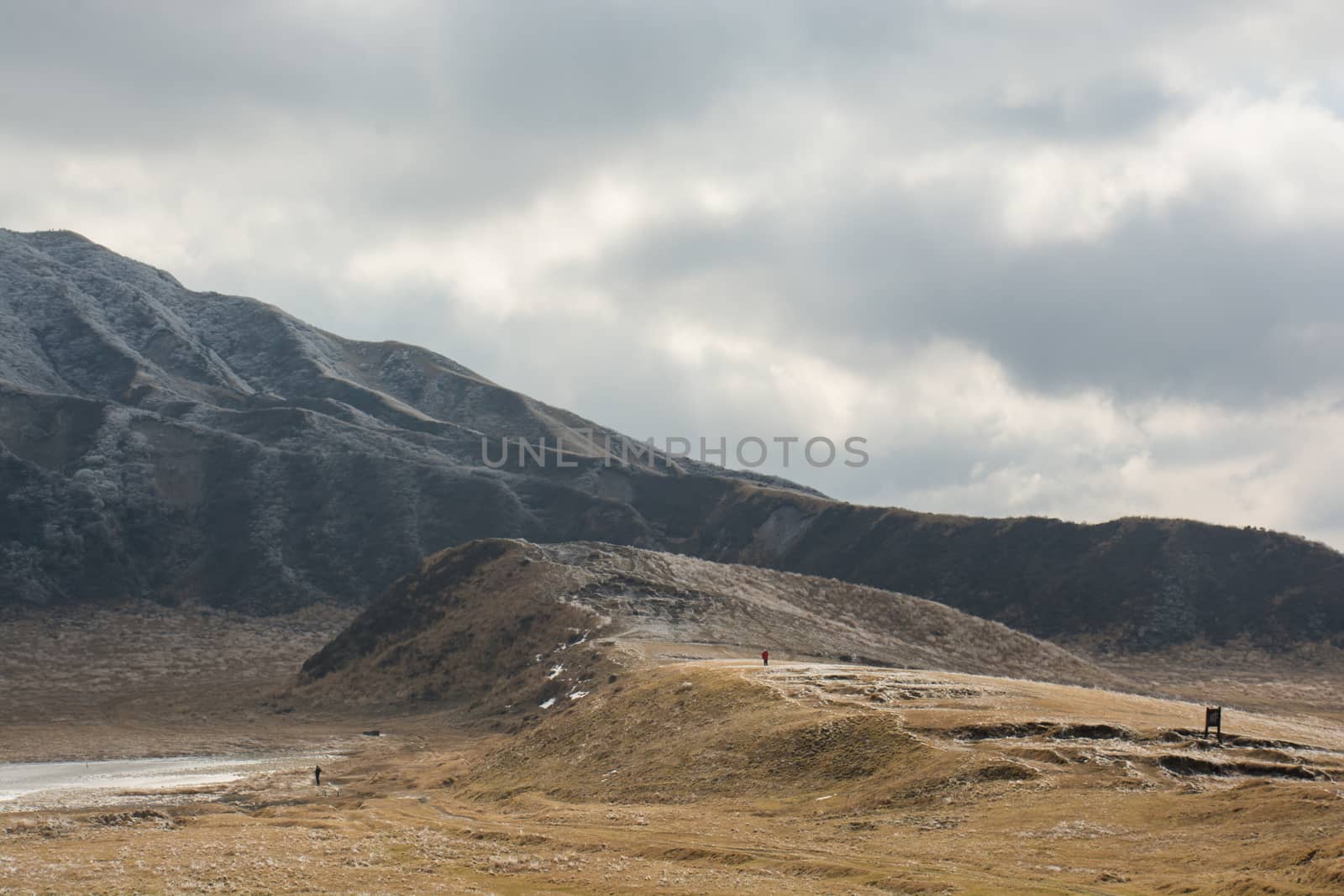 Mount Aso and Kusasenri in winter. covered by golden yellow grassland - Kumamoto, Japan