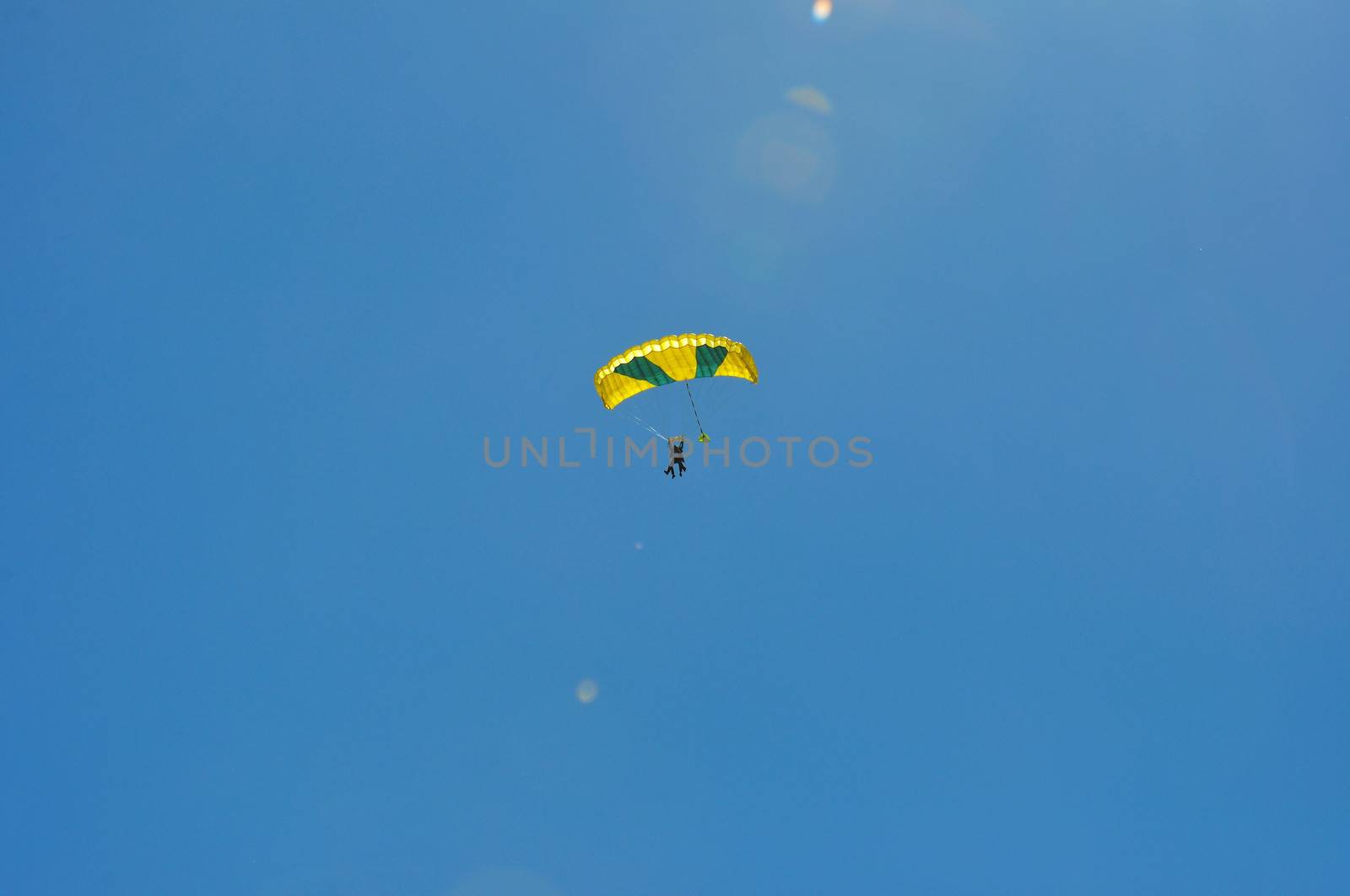paragliding flight, France. pleasure of flying in a blue sky