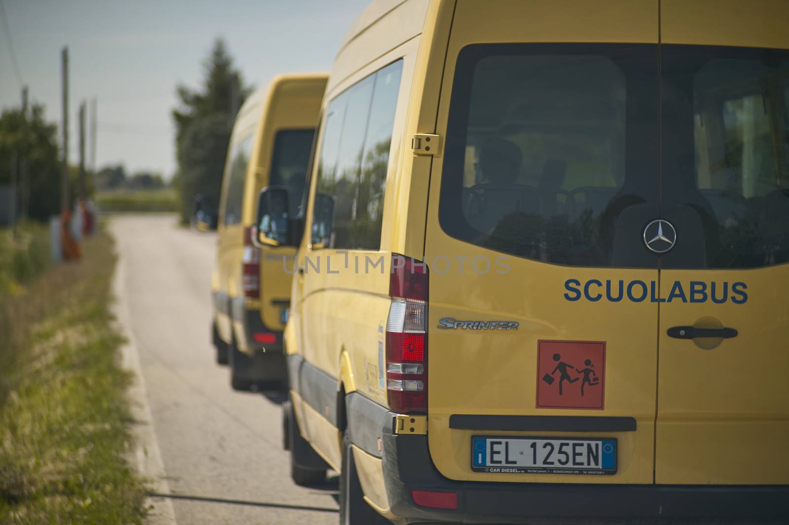 ROVIGO, ITALY 20 FEBRUARY 2020: Italian school bus travels on the road