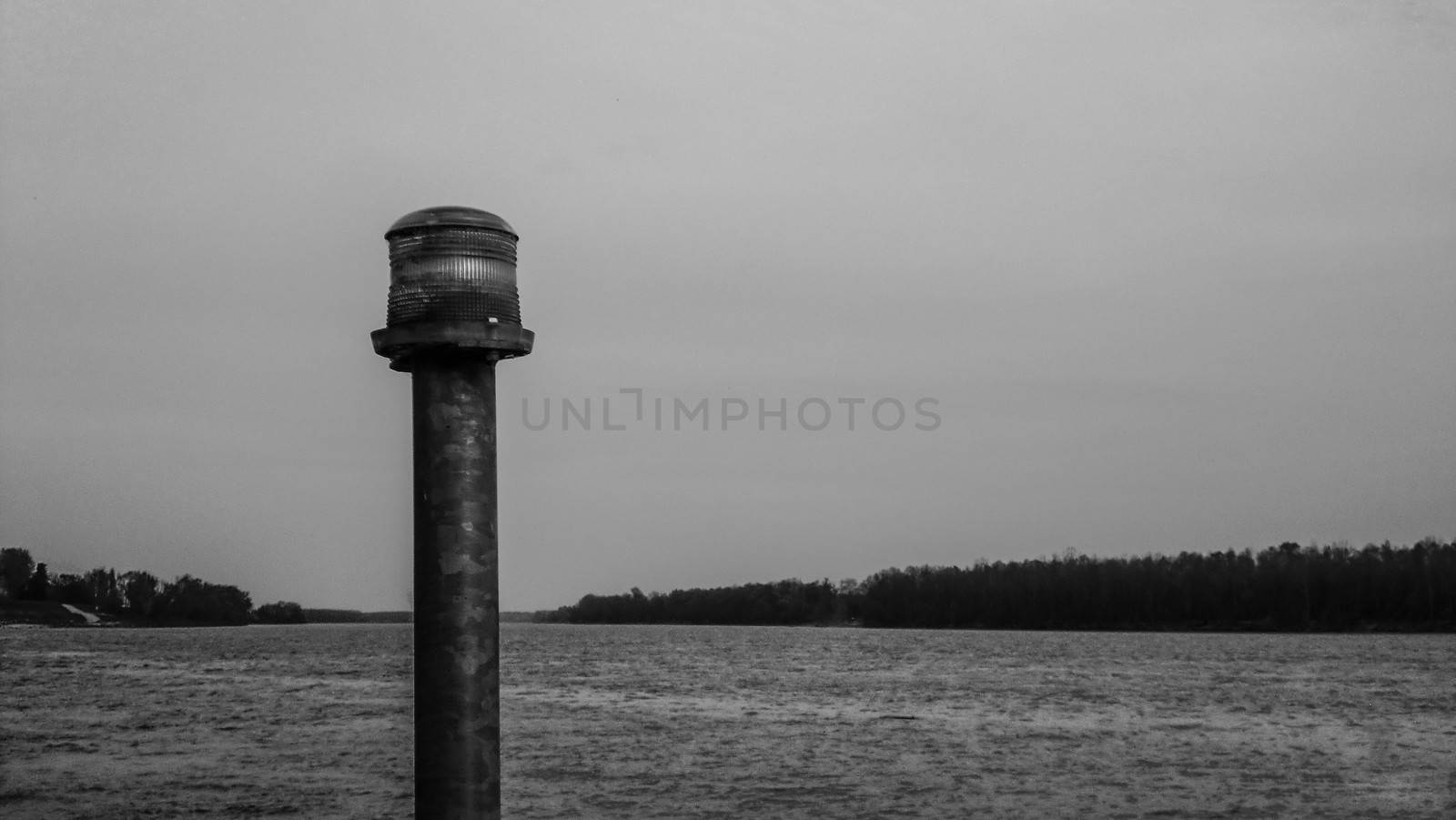 Signal light on the pier, image in balck and white