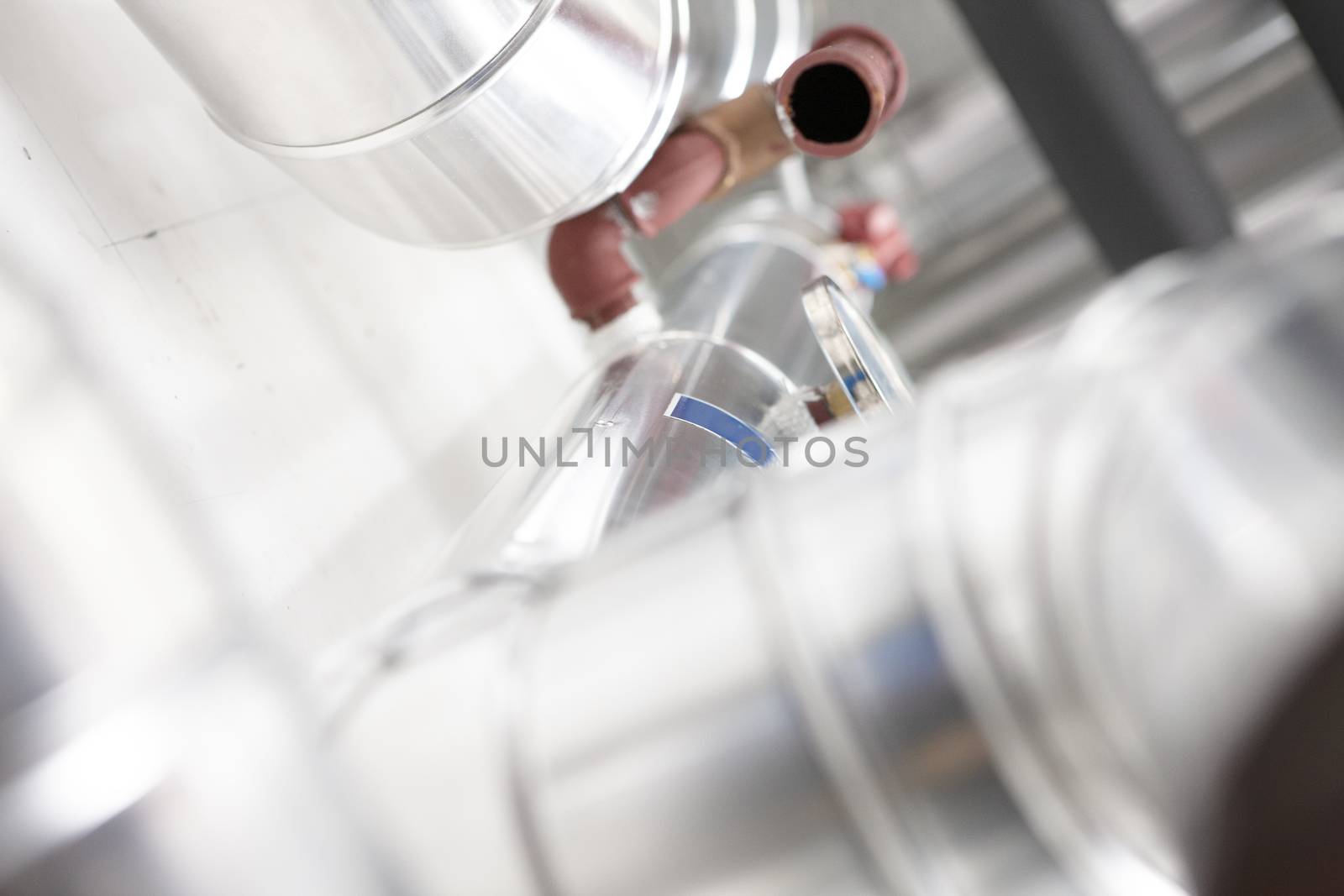 chrome pipes in heating and AC rooms in buildings of factories and hospital.. High key