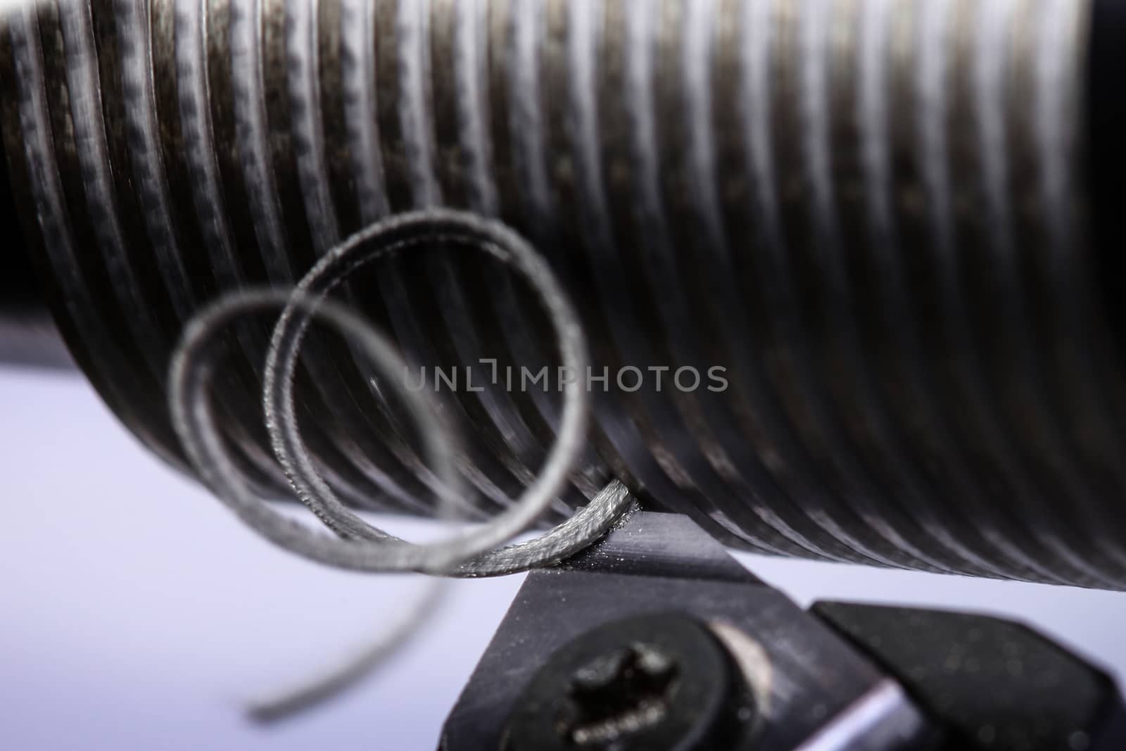 close up of metal cutting on lathe with metal carving off