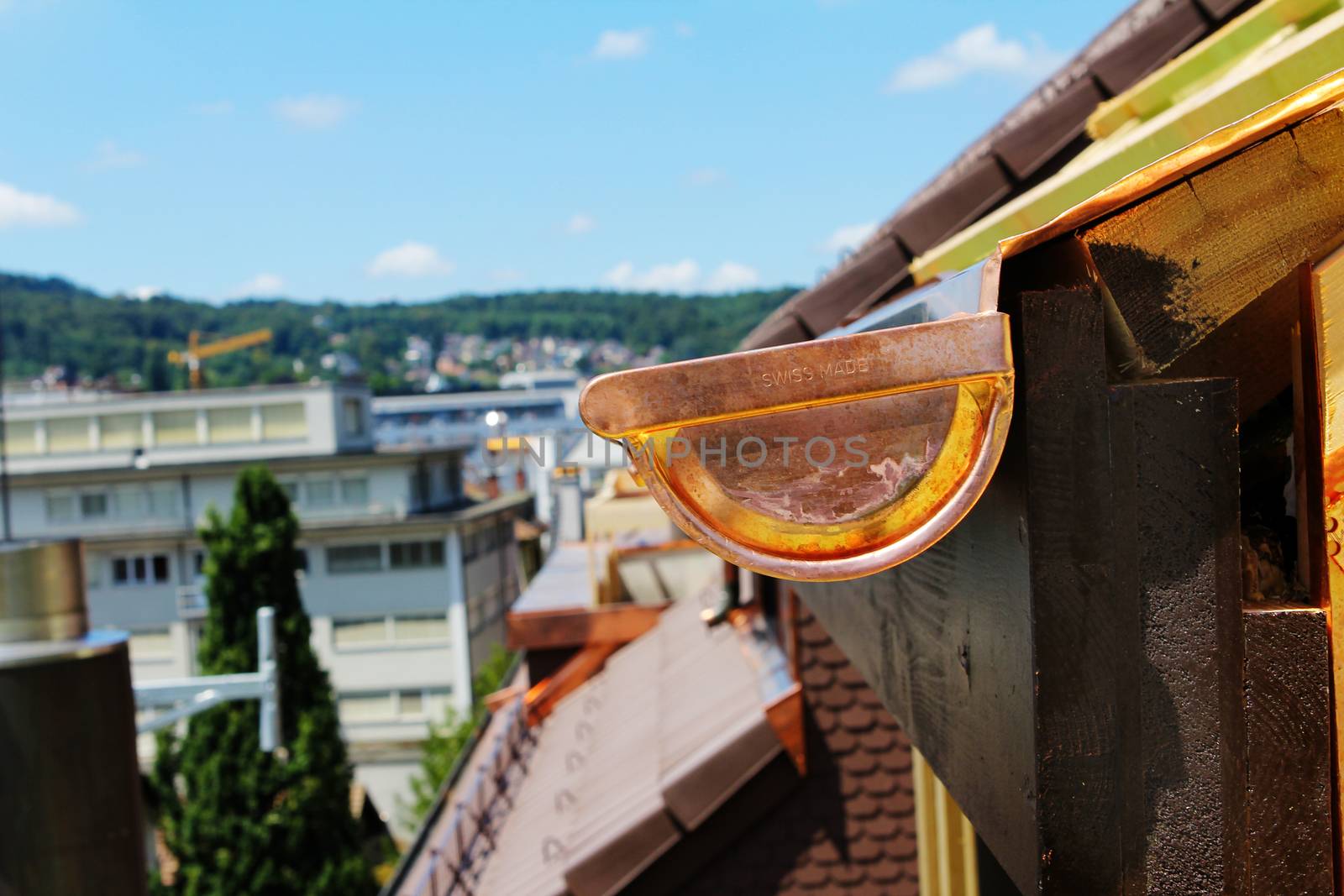roofing work on a house on Lucerne Switzerland. Close up of funnel