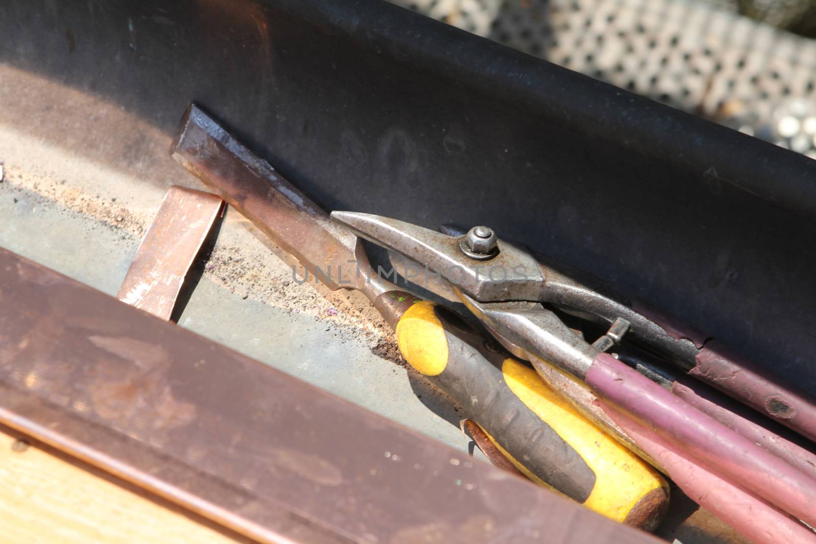 roofing work on a house on Lucerne Switzerland. Close up of tools