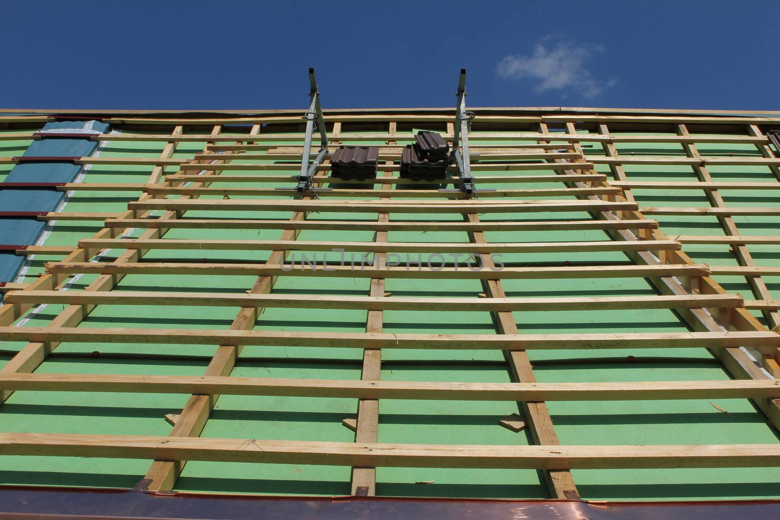 roofing work on a house on Lucerne Switzerland. With green color