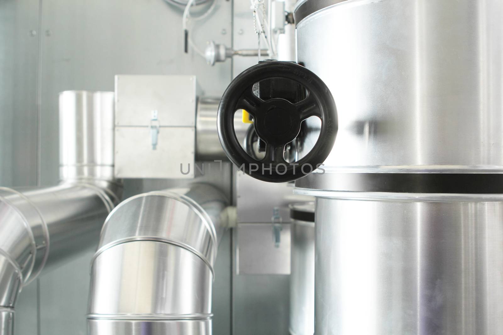 chrome pipes in heating and AC rooms in buildings of factories and hospital. With silver and black color