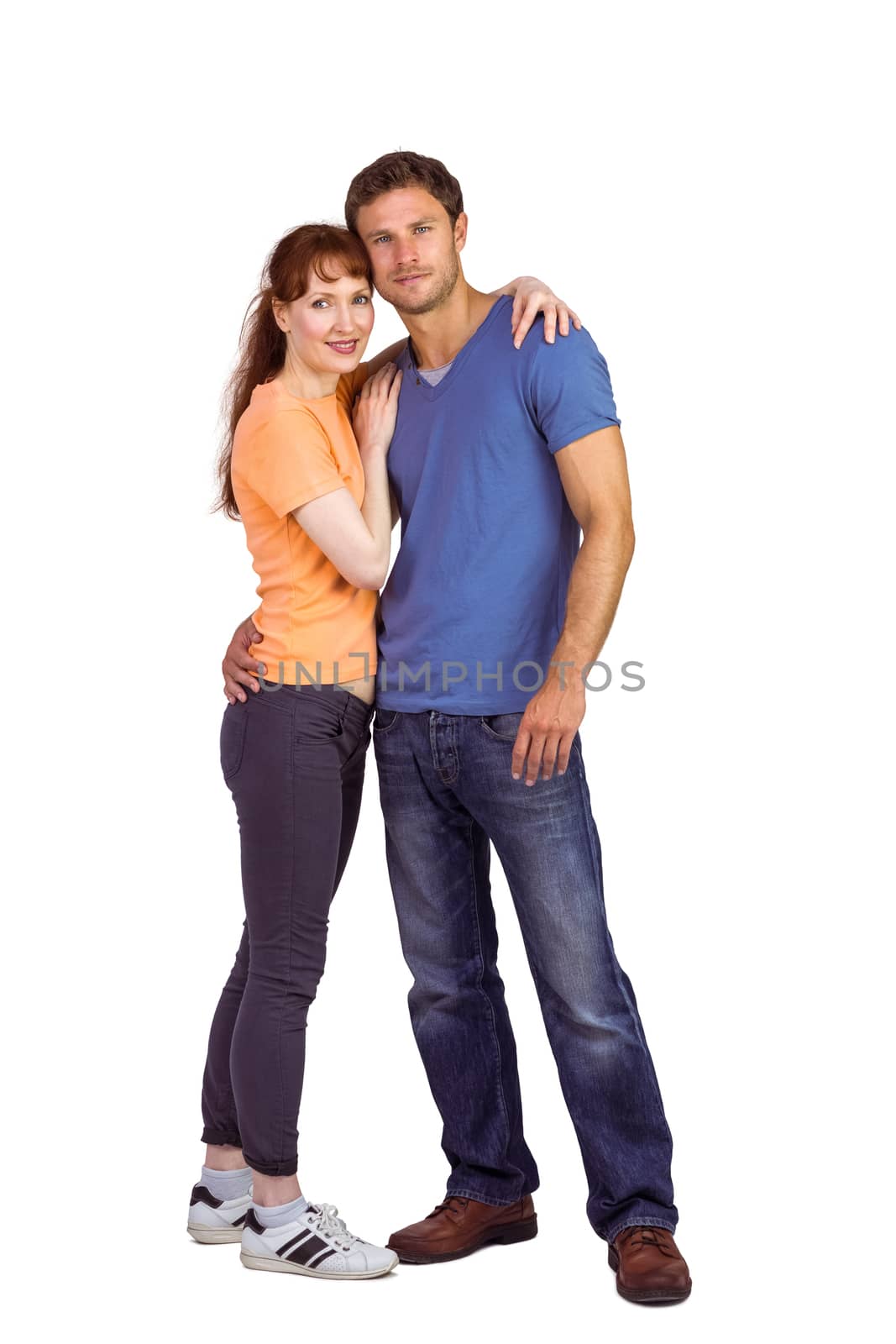 Couple looking at the camera on white background
