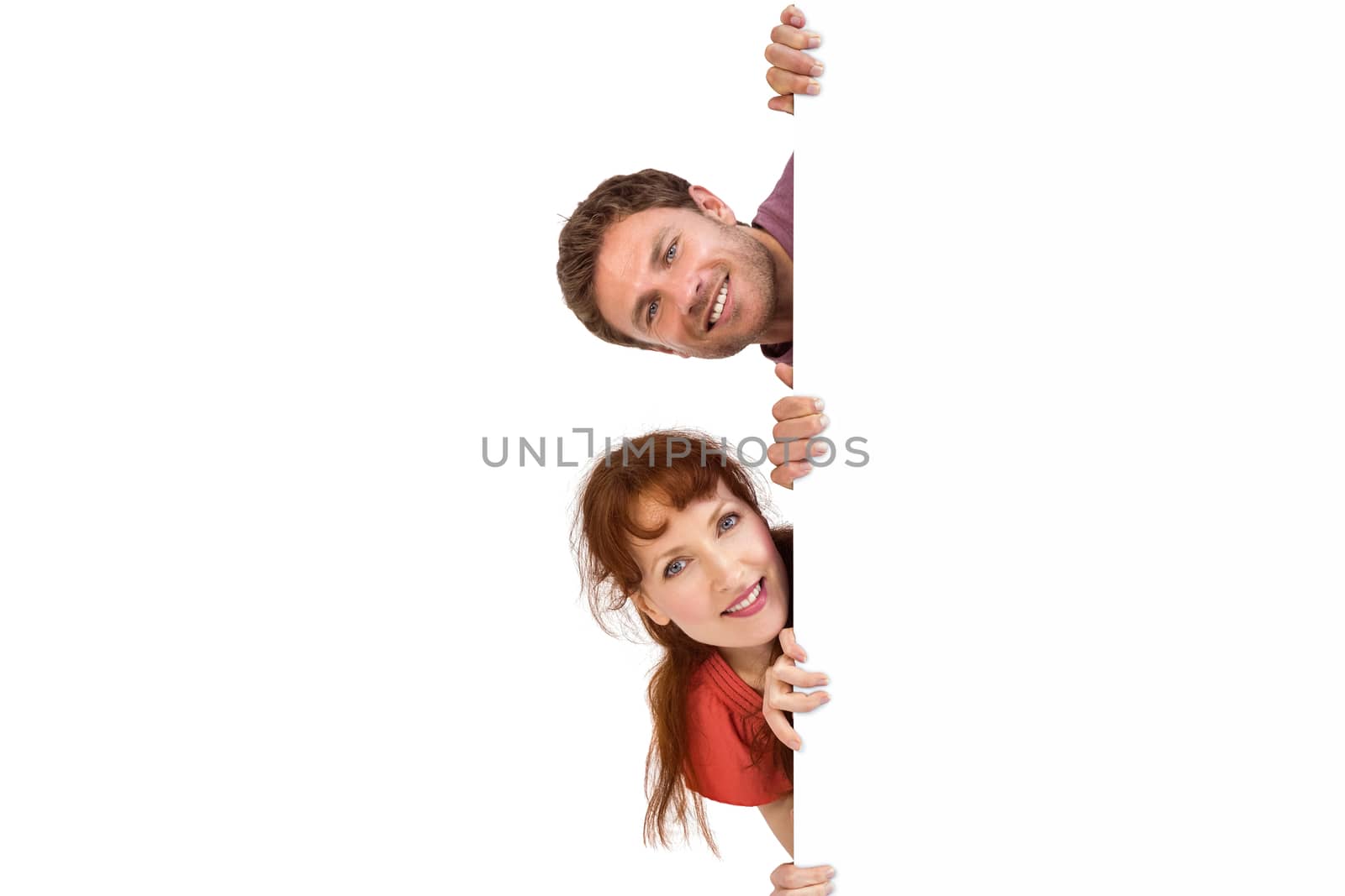 Couple looking at the camera on white background