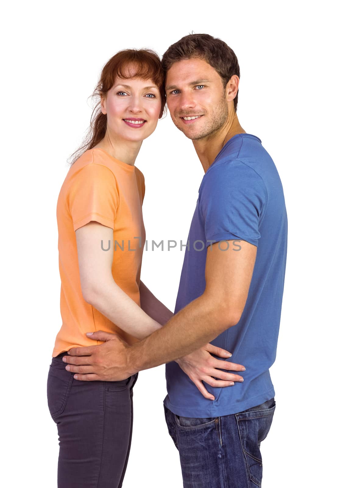 Couple looking at the camera on white background