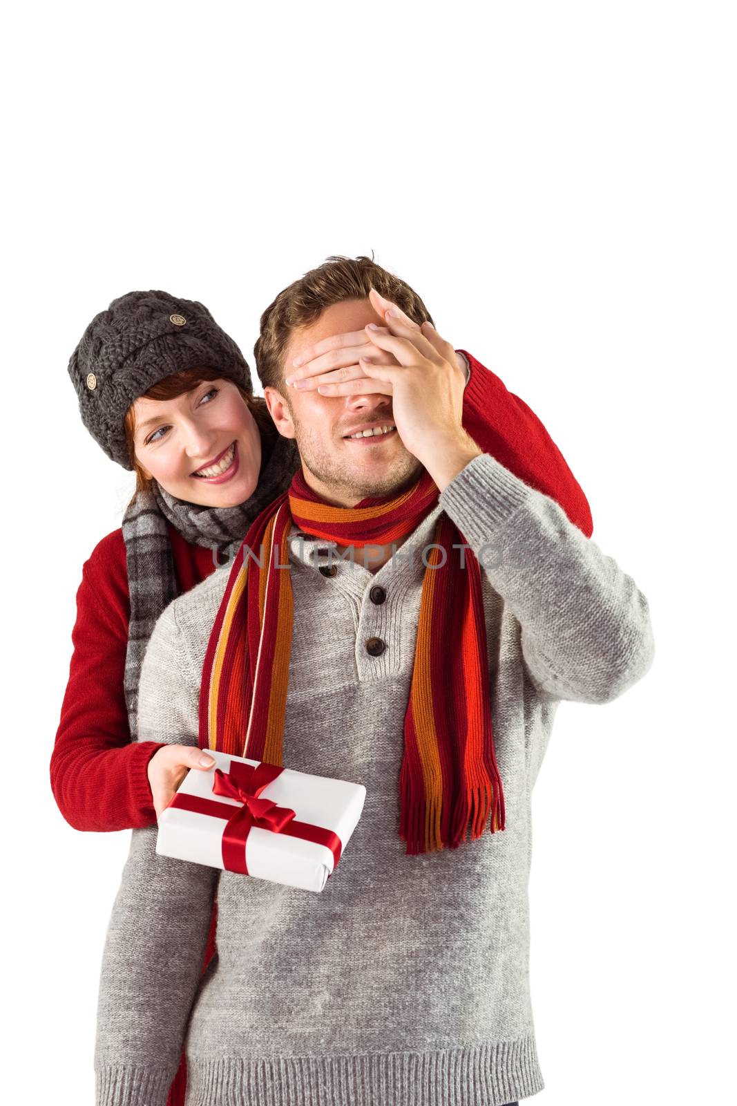 Woman giving man a present on white background