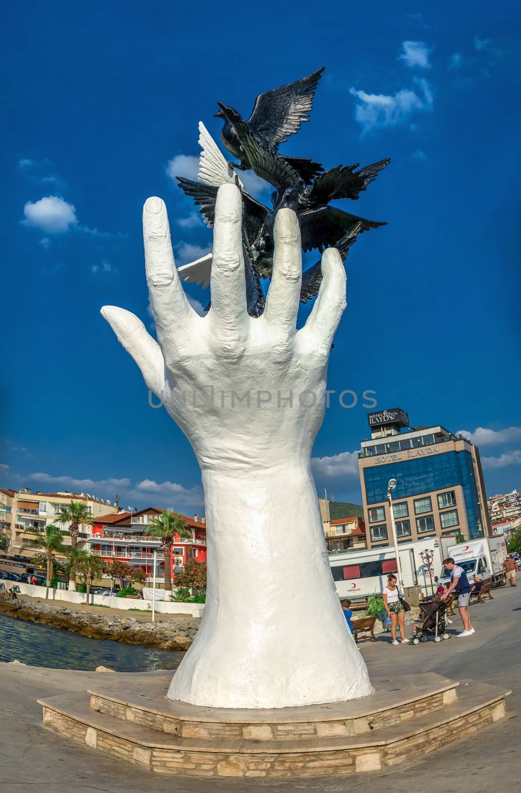 Kusadasi, Turkey – 07.18.2019.  Hand of Peace sculpture on the Kusadasi promenade in Turkey