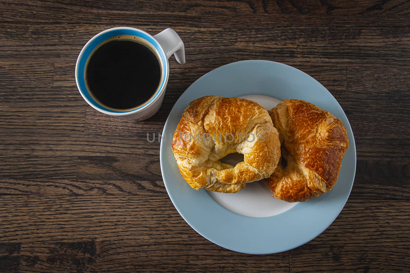 Coffee and croissant breakfast by mypstudio