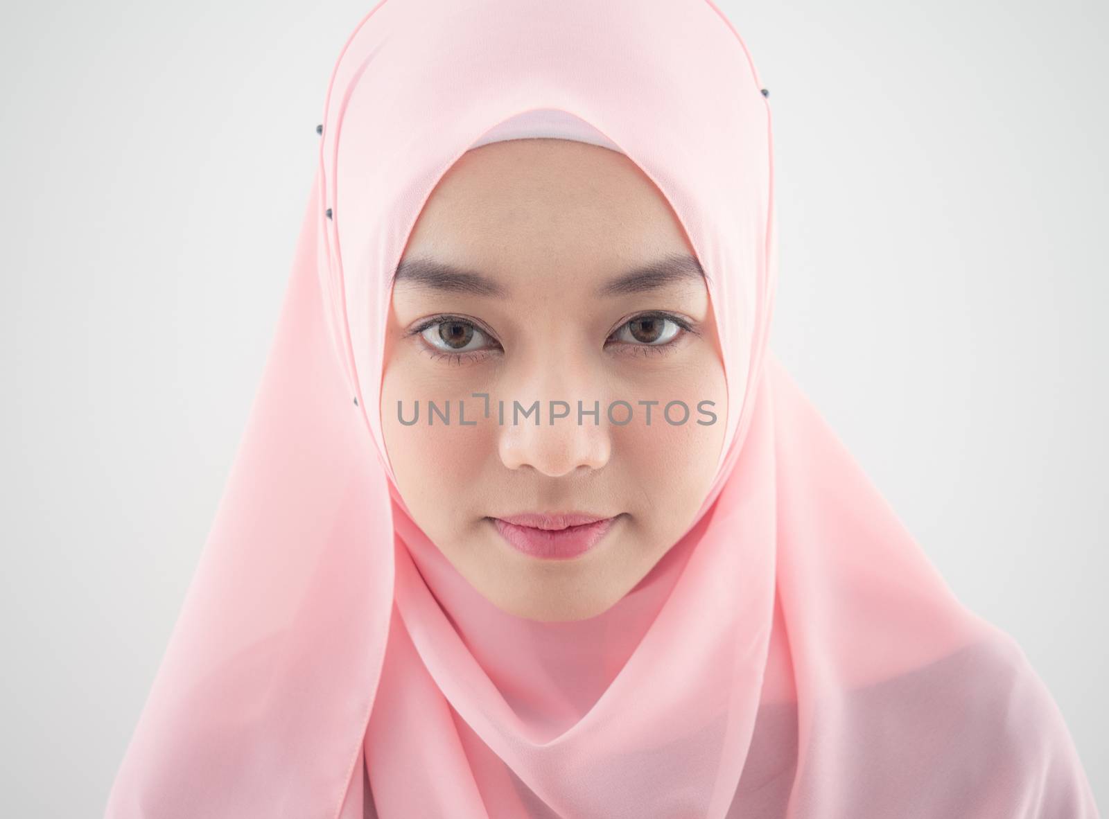 Portrait of a beautiful Muslim Asian woman by panyajampatong