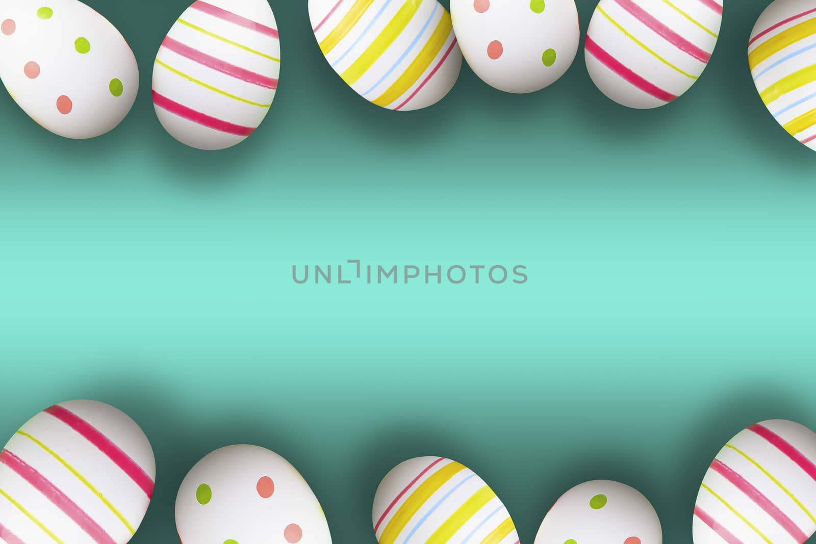 Colorful easter eggs on a green background with soft shadows by oasisamuel