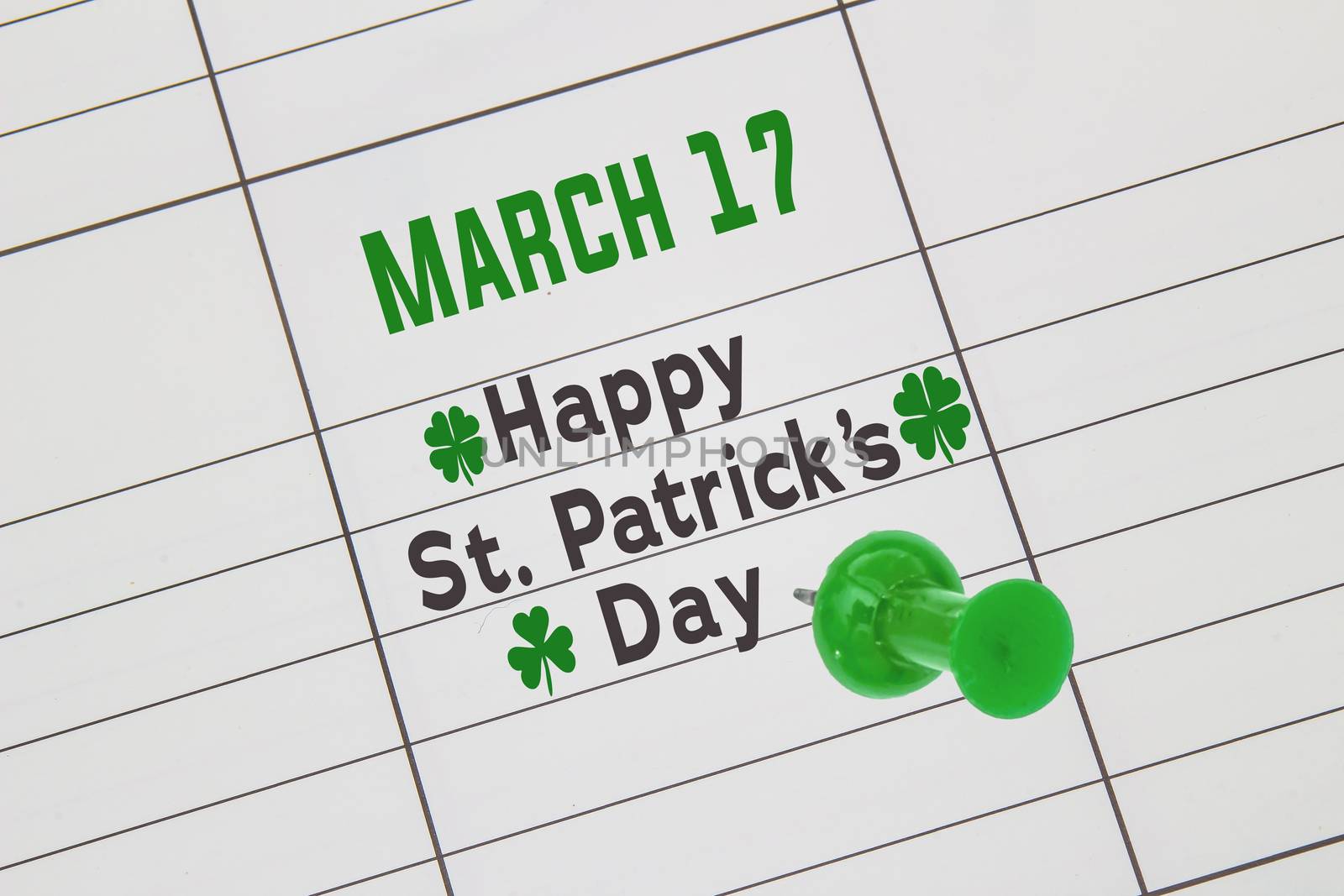 A close up of a calendar on March 17 with the text: Happy St. Patrick's Day