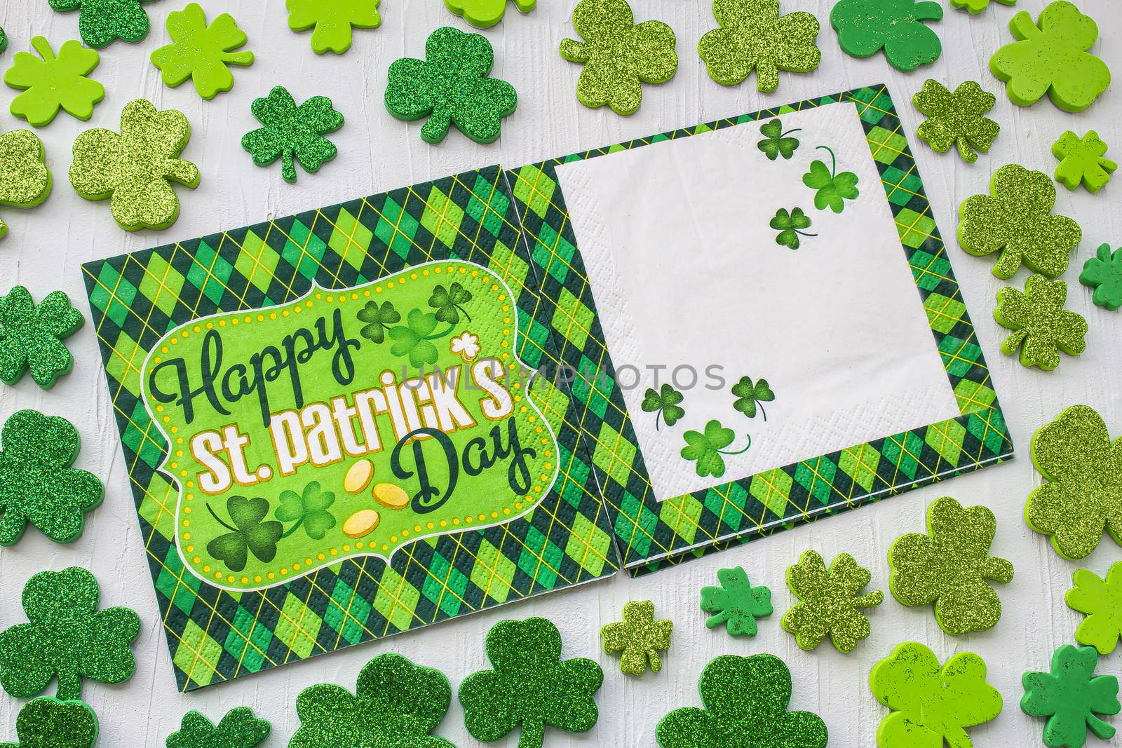 St Patrick's Day napkins surrounded by green clovers