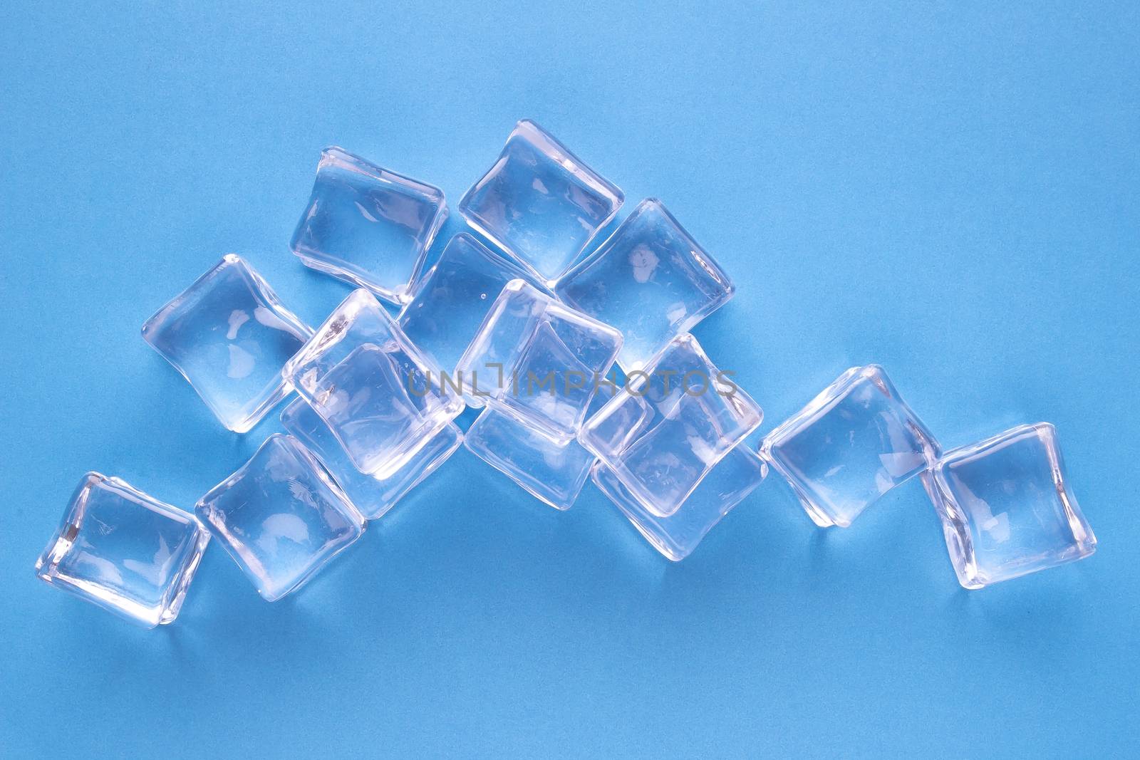 Crystal Ice cubes on a blue background by oasisamuel