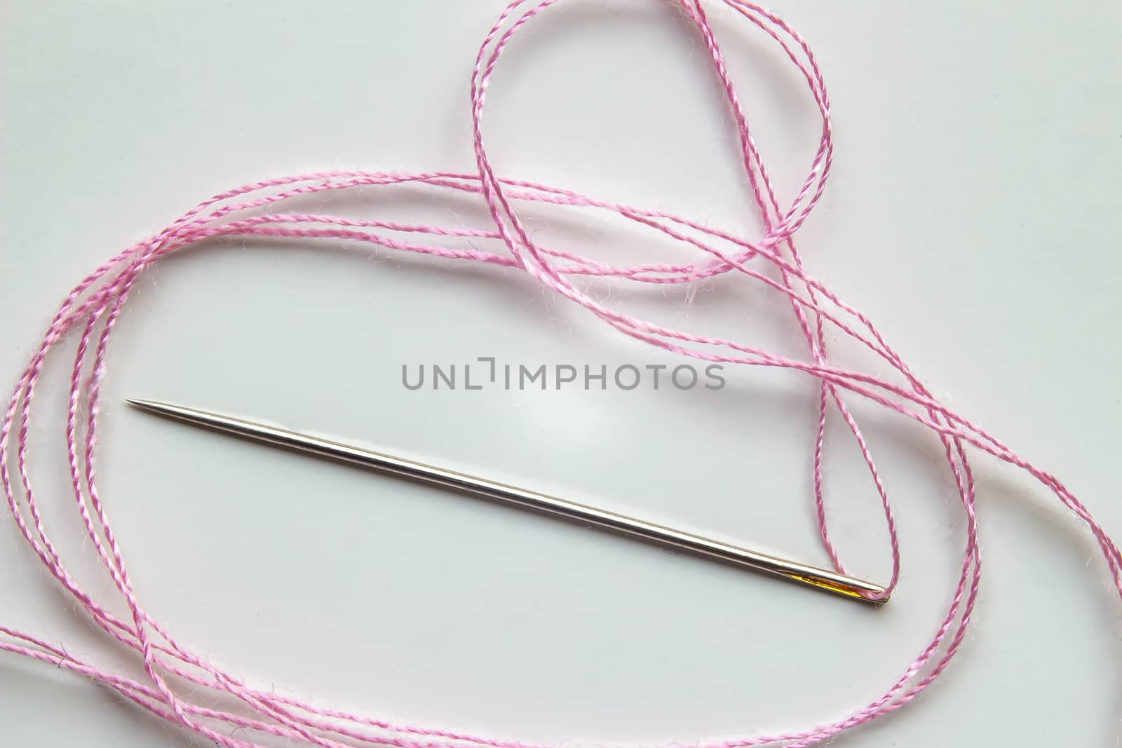 Needle with a Pink Treat on a white background by oasisamuel