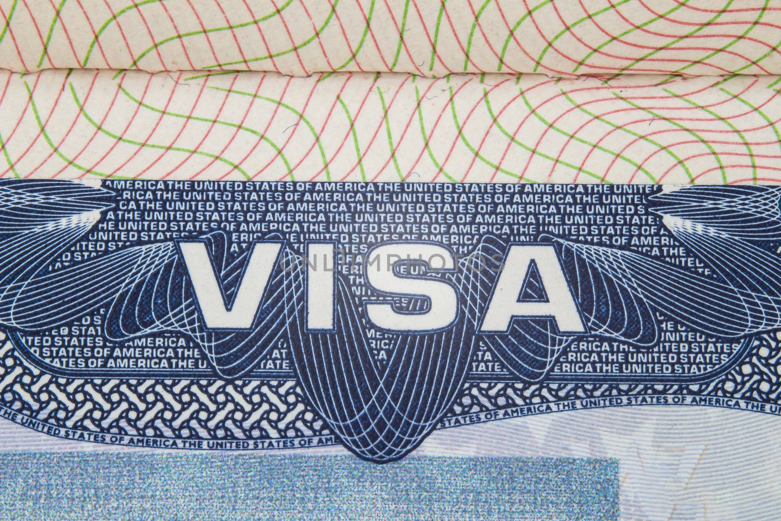 A close up to an American visitor permit on focus on the word VISA