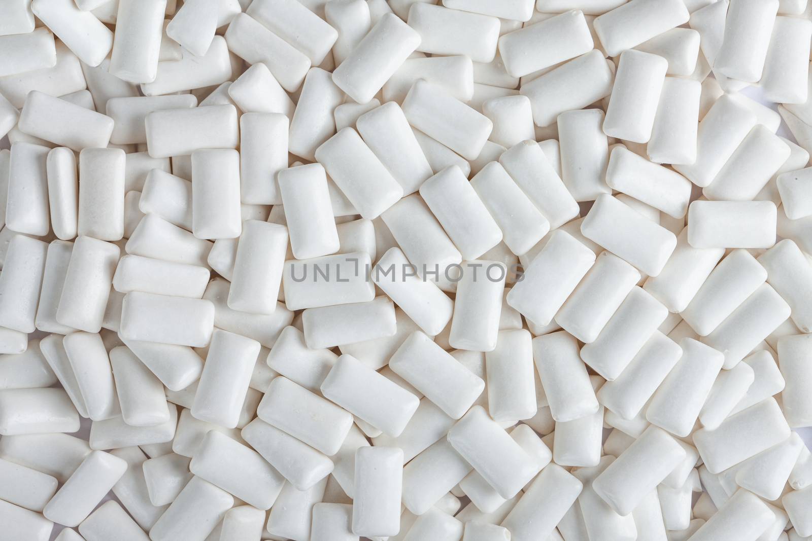 a pile of white chewing gum shot from above