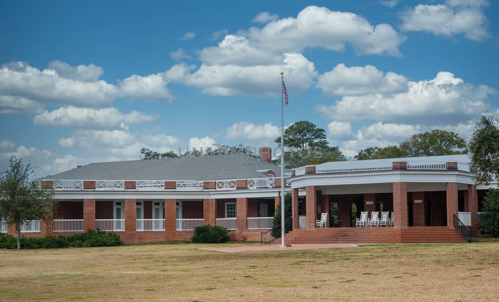 Brick Pavilion with American Flag in Winter by dbvirago