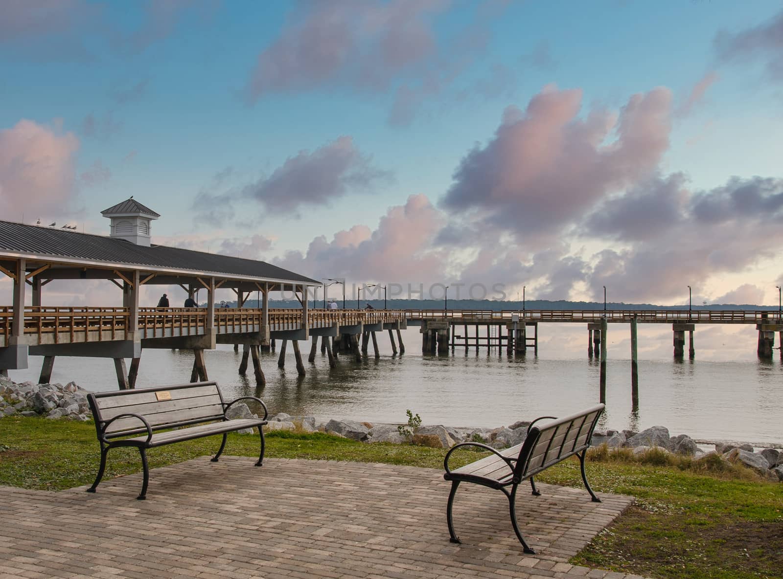 Empty Benches by a Winter Pier by dbvirago