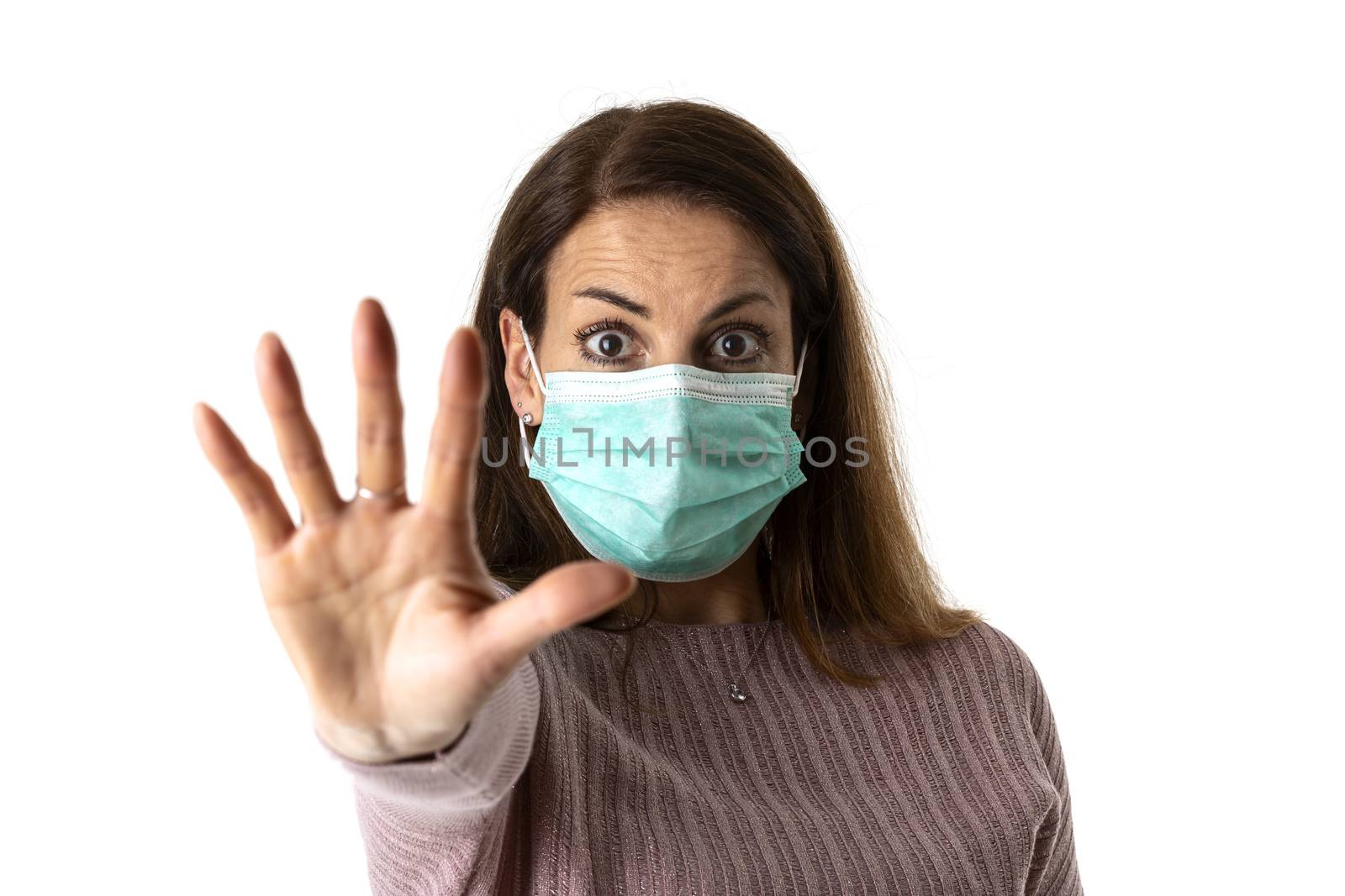scared woman with a medical mask
