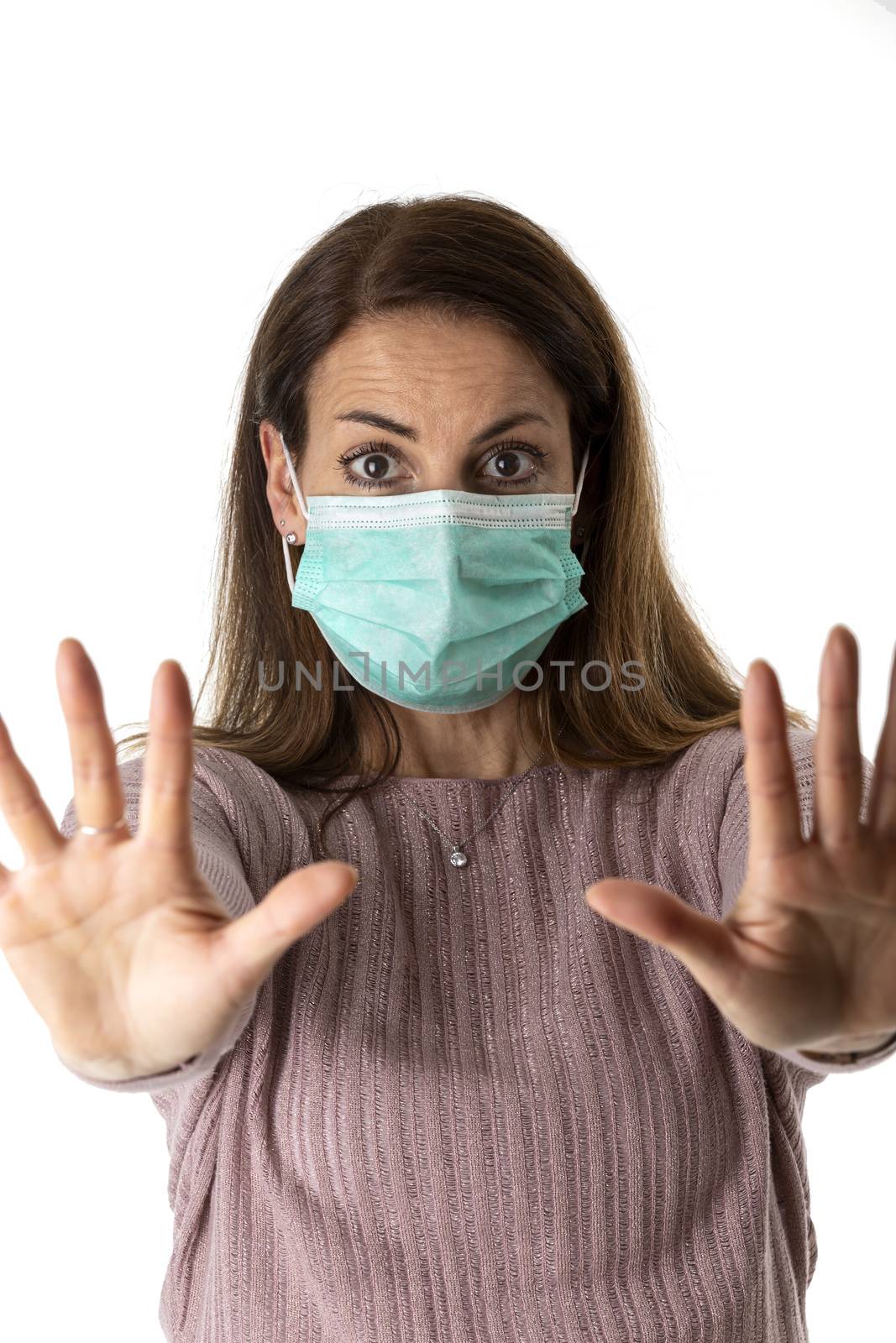 scared woman with a medical mask by bernjuer