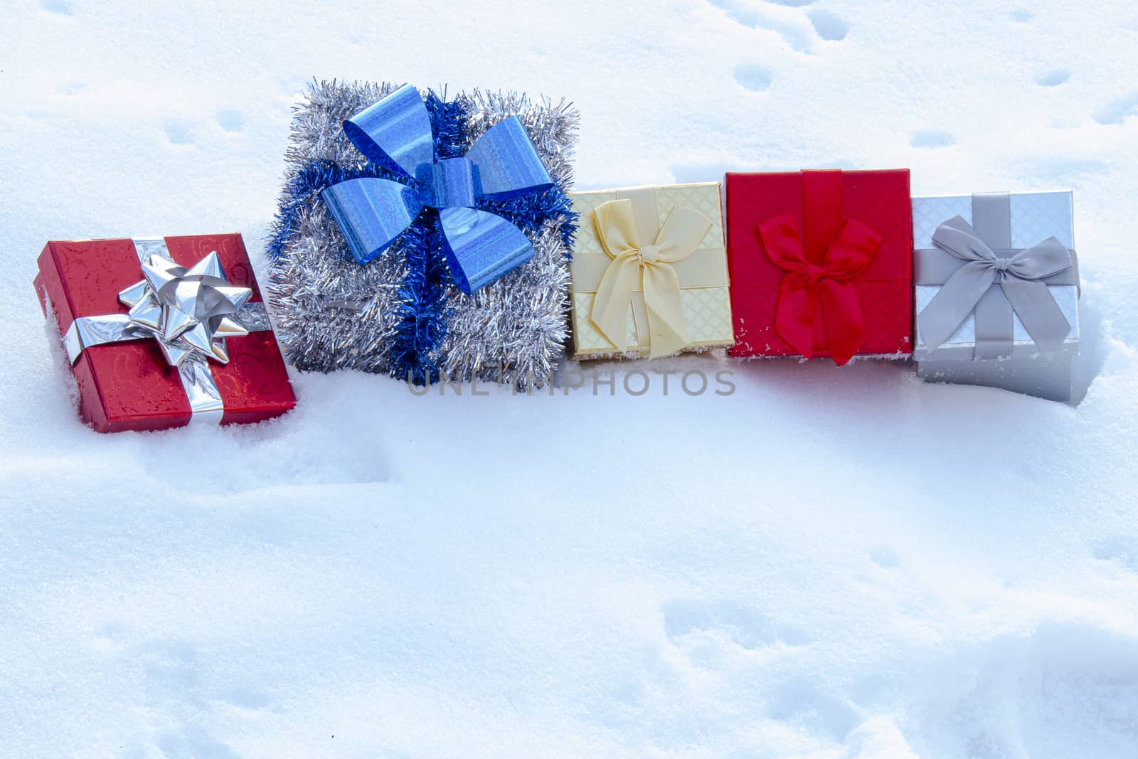 Colourful Gift boxes Presents on snow by oasisamuel