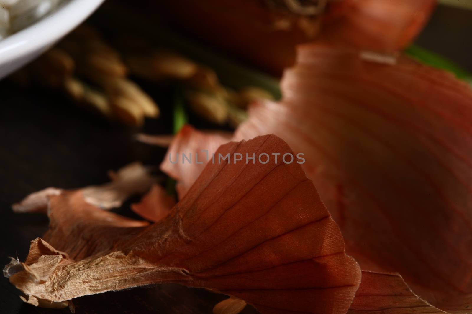 Healthy organic raw food ready for cooking. Close up of onion peel with rice corn