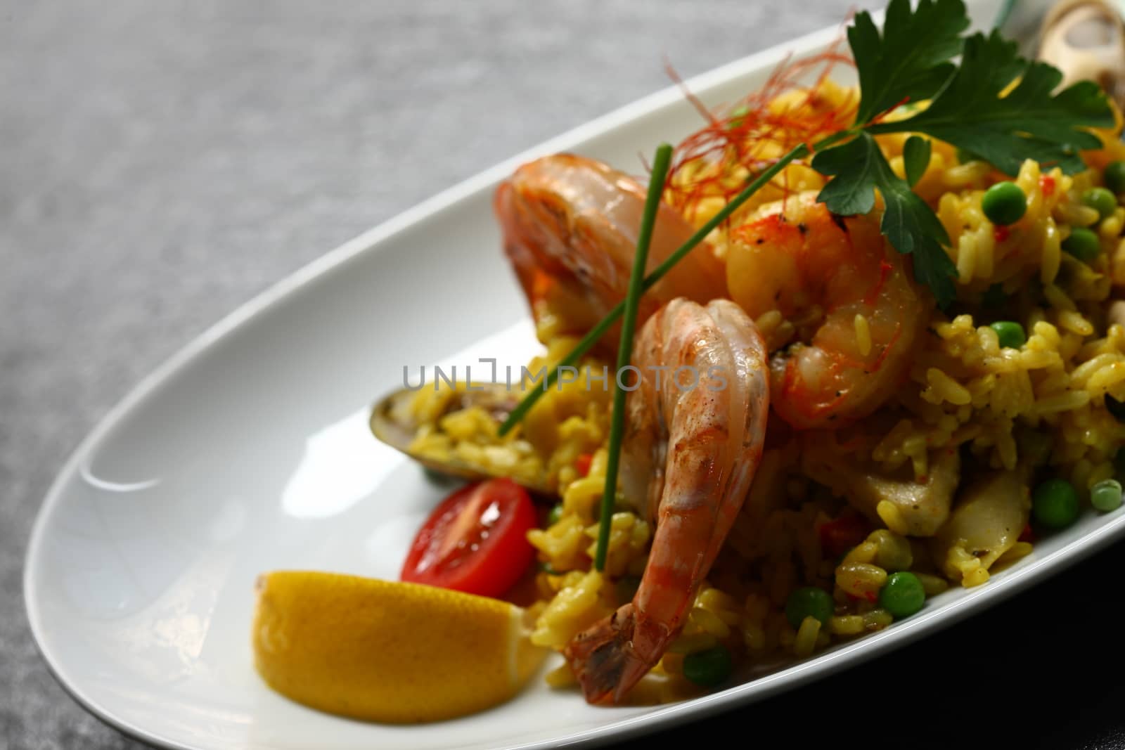 dish with shrimp and salad and wine