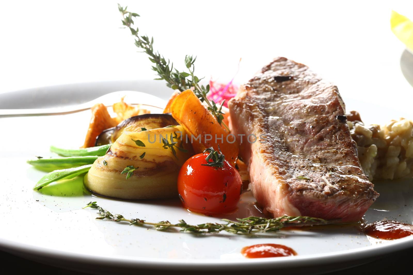 Close up of a piece of meat. a good meal with vegetables on a white plate