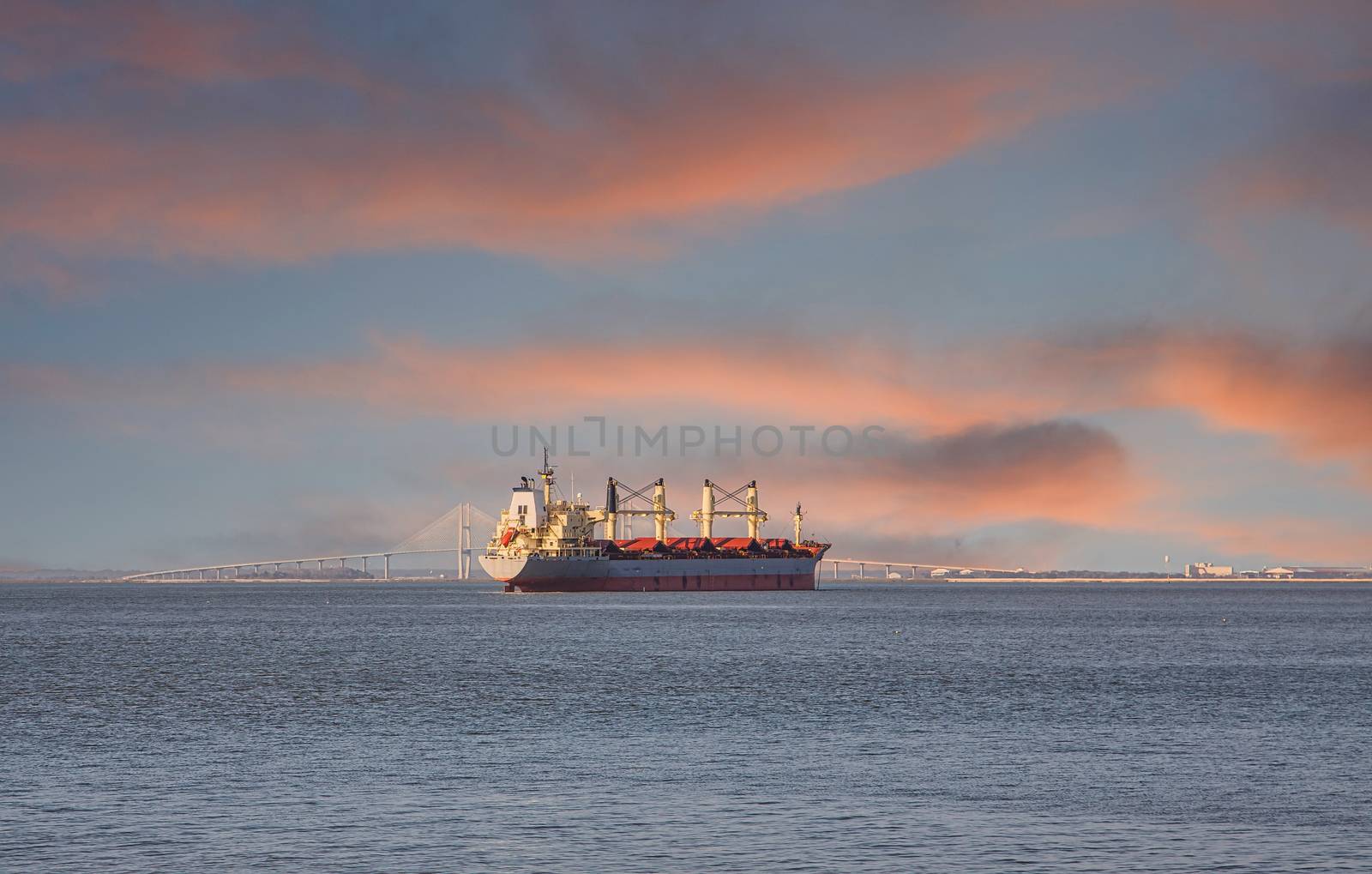 Dredging Ship in Empty Bay at Dusk by dbvirago