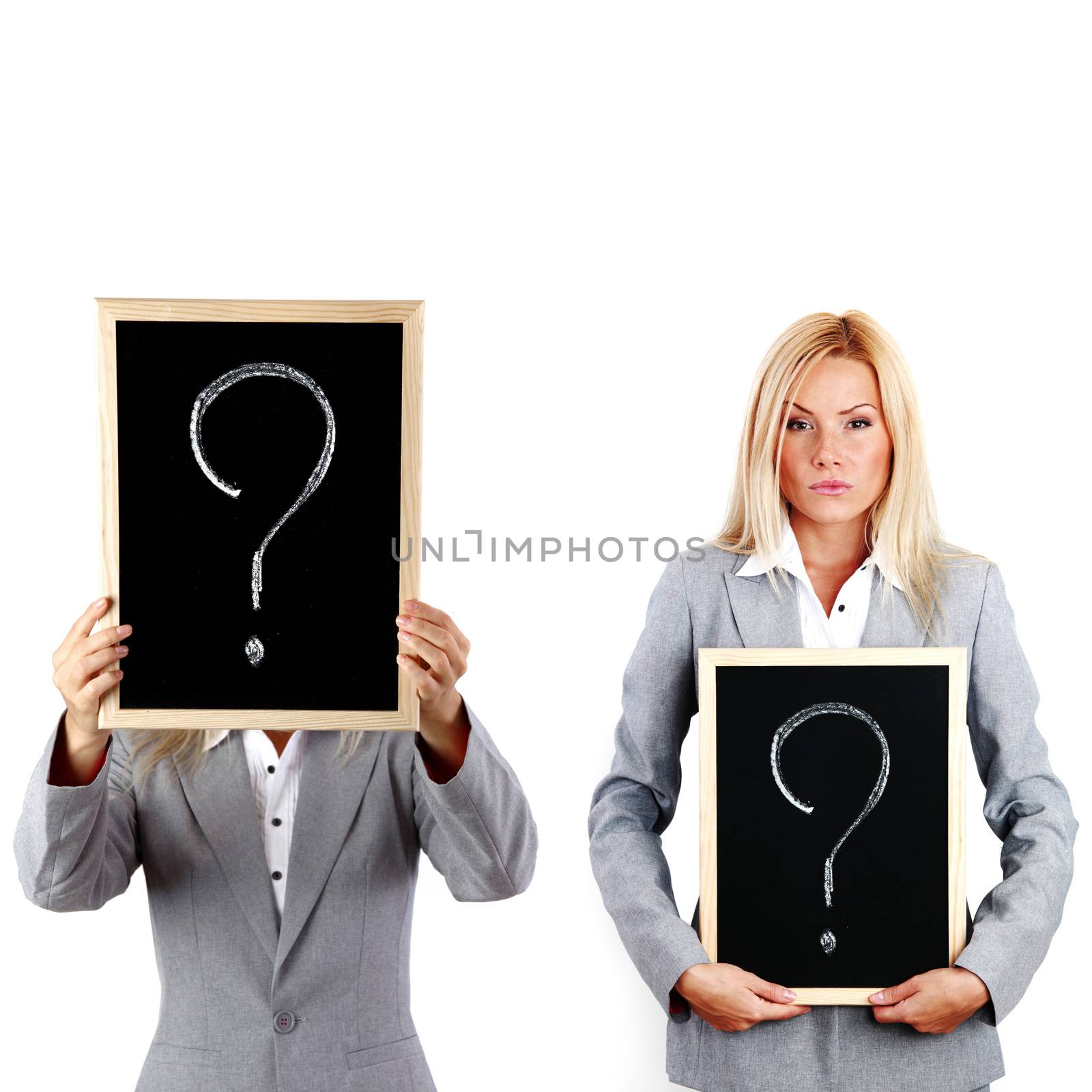 Young business woman in suit hold question sign on blackboard in hands