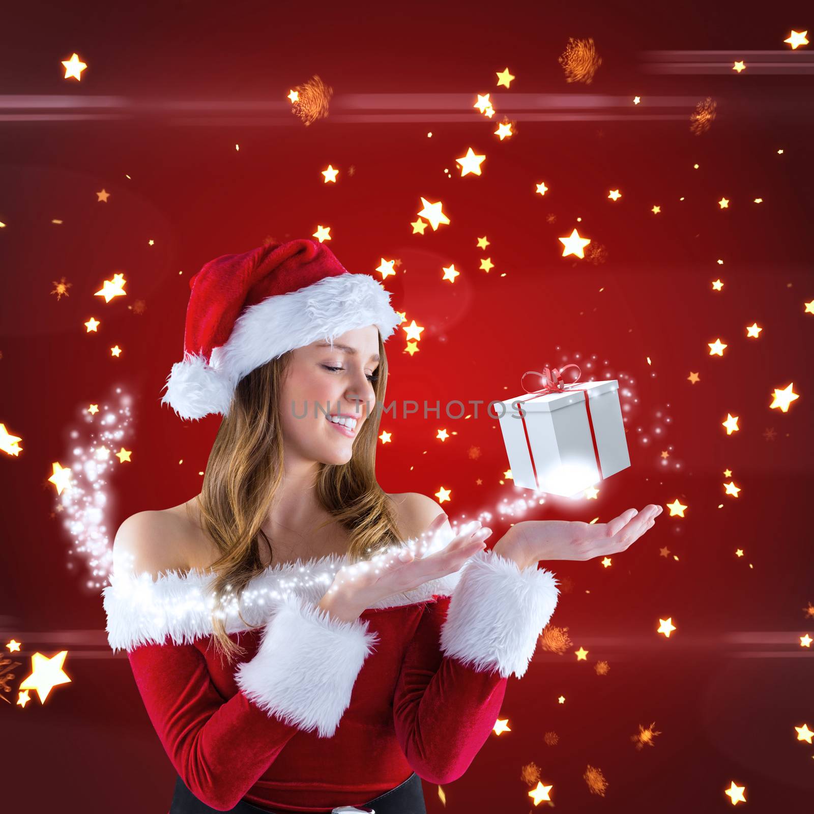 Sexy santa girl presenting with hand against bright star pattern on red