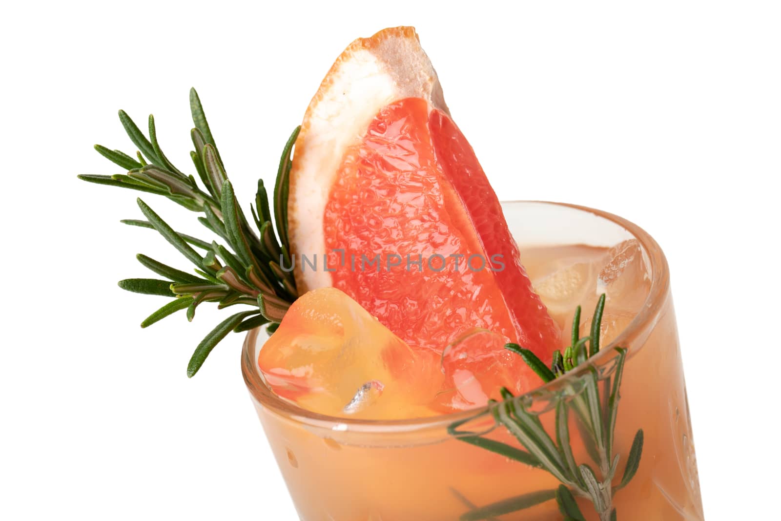 Cold cocktail drink with slice of grapefruit and rosemary