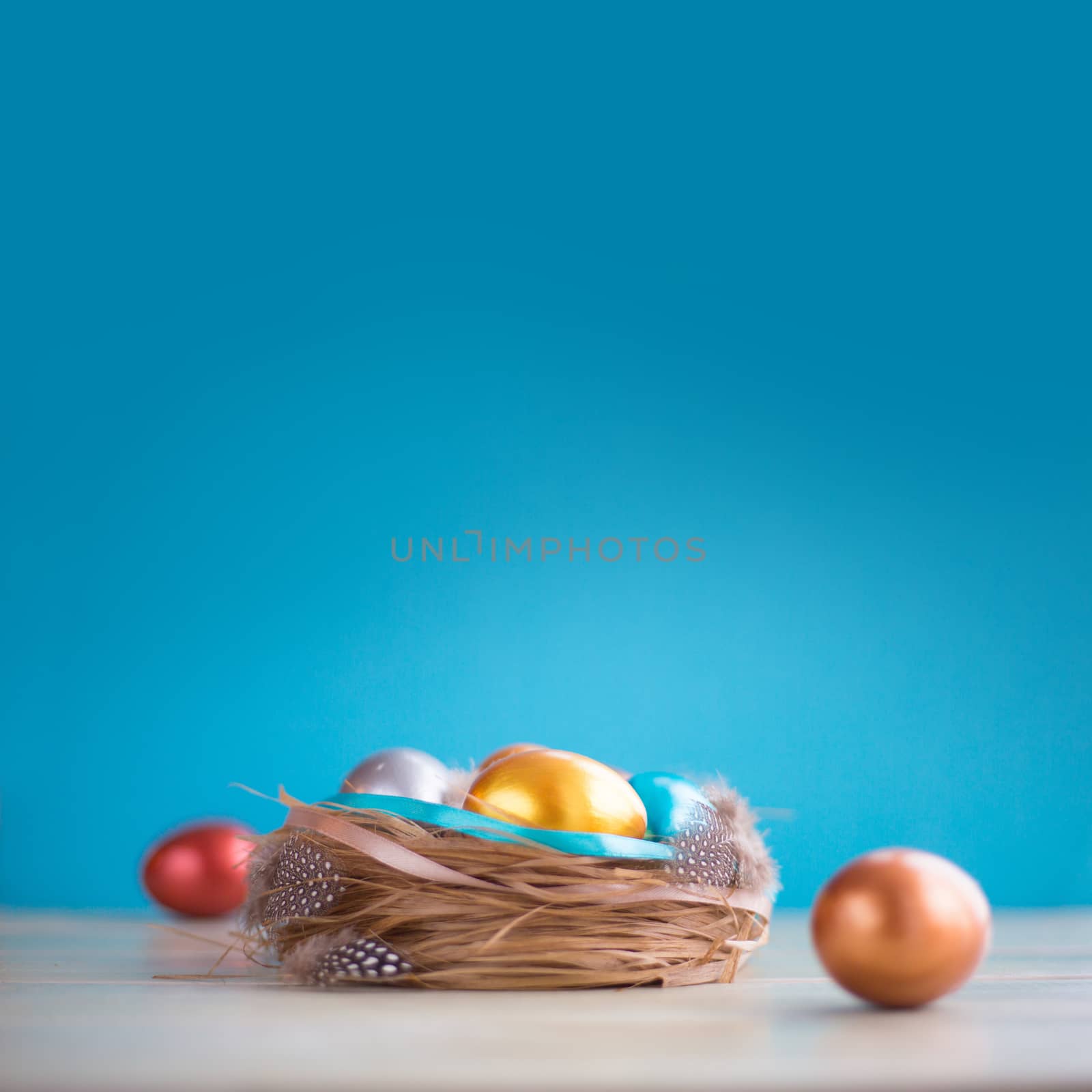 Decorated easter nest with eggs by destillat