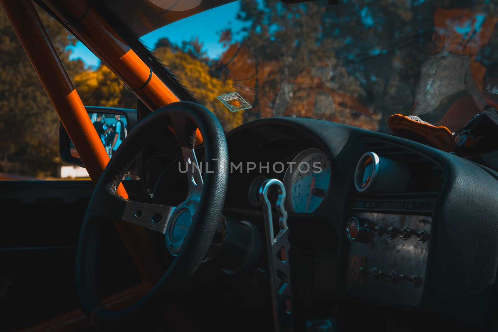 A glimpse in a race car fully equipped with the gear required to be a true champion.