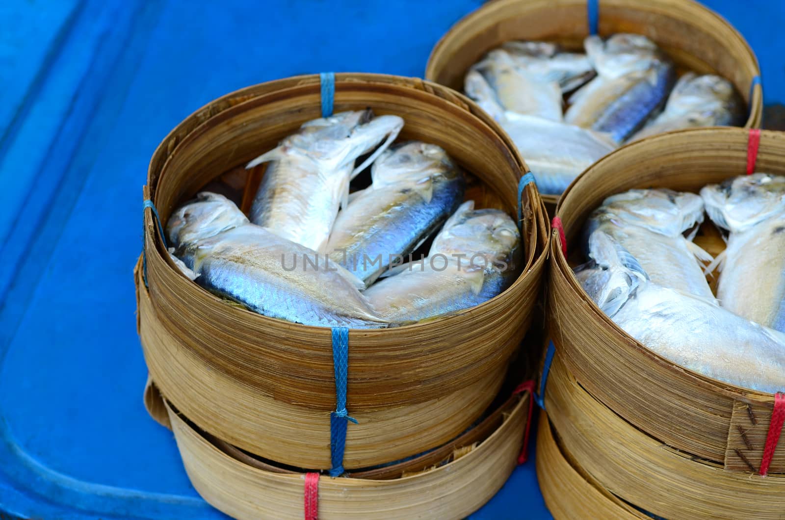 Cooked fish traditionally packed in bamboo bowls