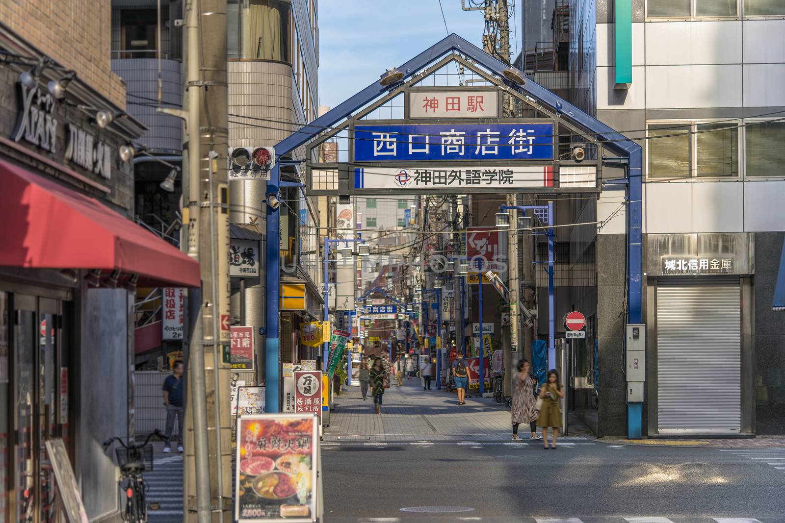 Blue metal entrance gate of the shopping street by kuremo