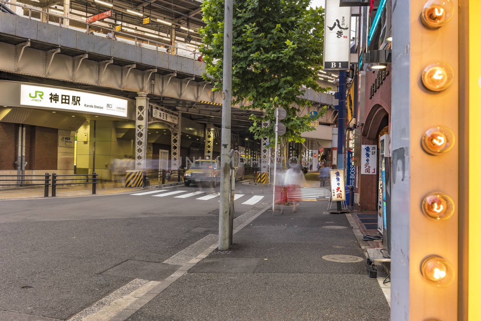 Underpass with metal pillar and neon signs at the west entrance by kuremo