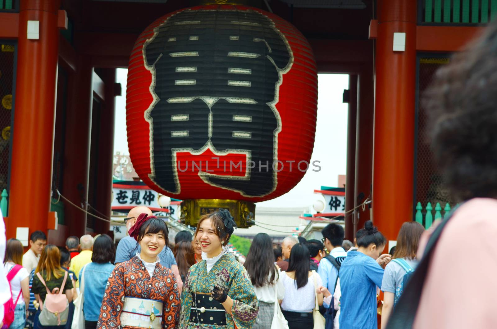 Tokyo, Japan - May 28, 2018: foreigner tourist wearing kimono, the national tradition costume of Japan walking at Sensoji temple the famous temple in Tokyo, Japan