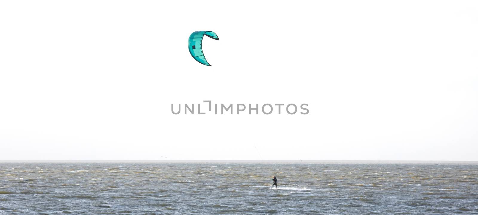 Kitesurfing on the waves by michaklootwijk