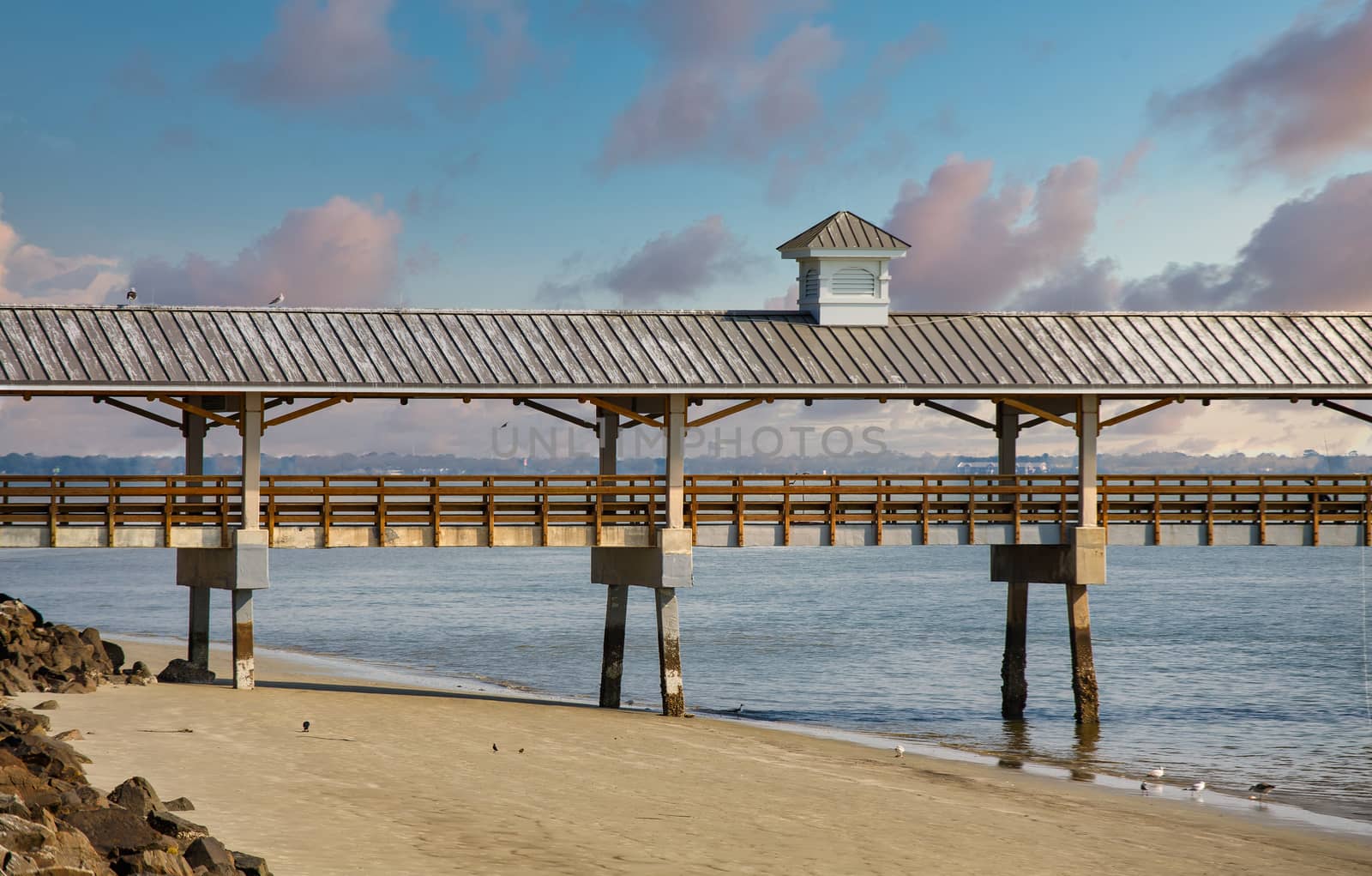 Old Wood and Concrete Pier at Dusk by dbvirago