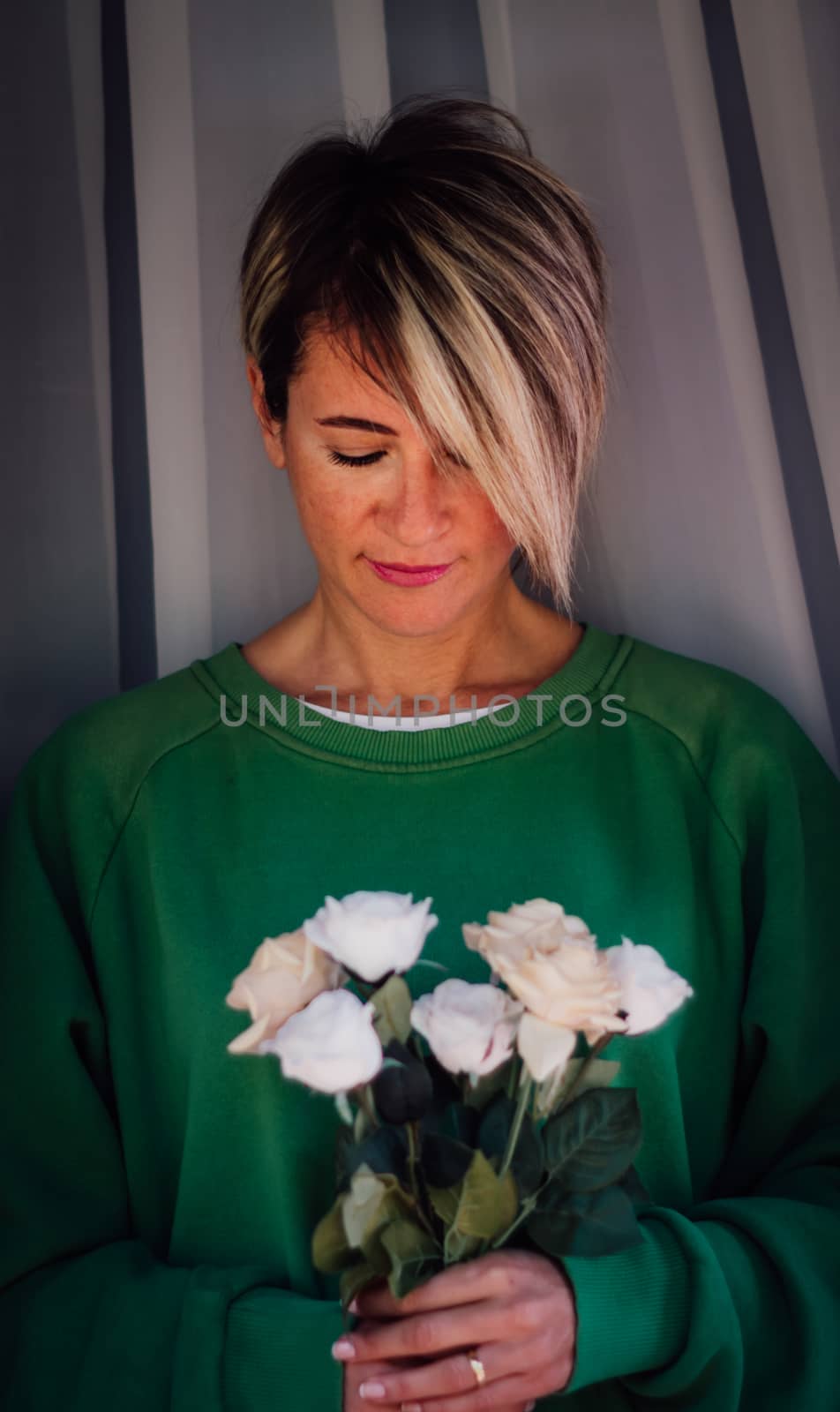 Portrait of a pretty blonde woman with bouquet. by Emurado