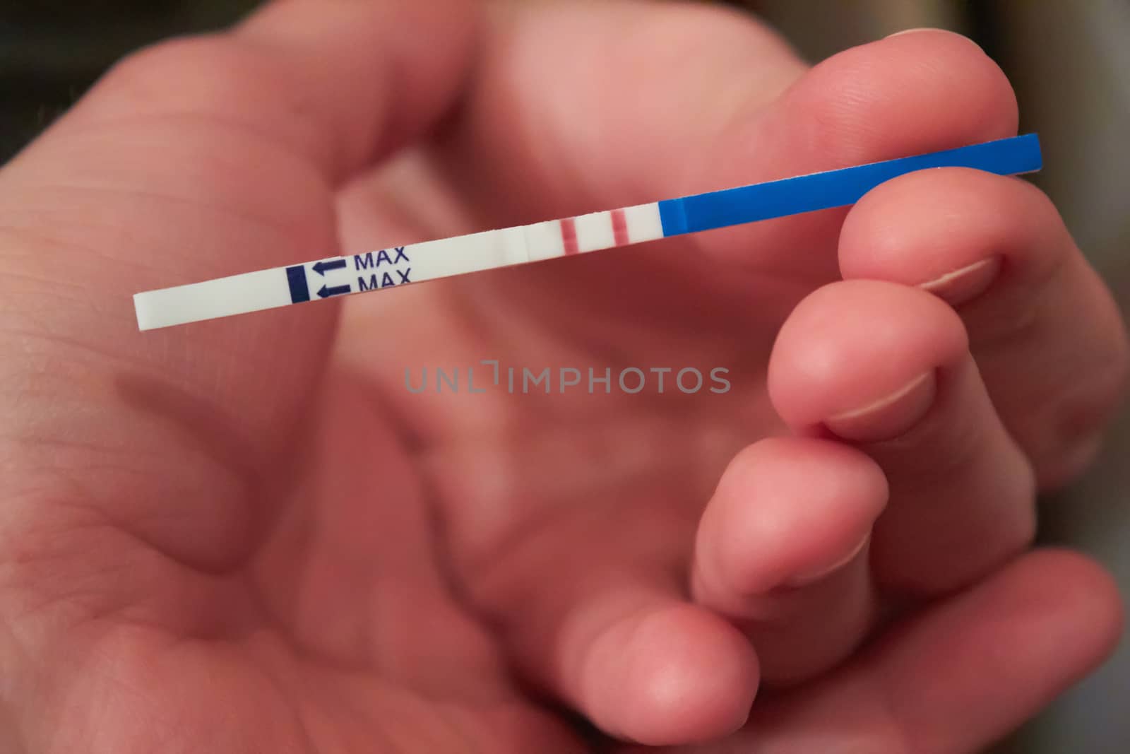 Woman holding pregnancy test, New life and new family concept. Shallow dof