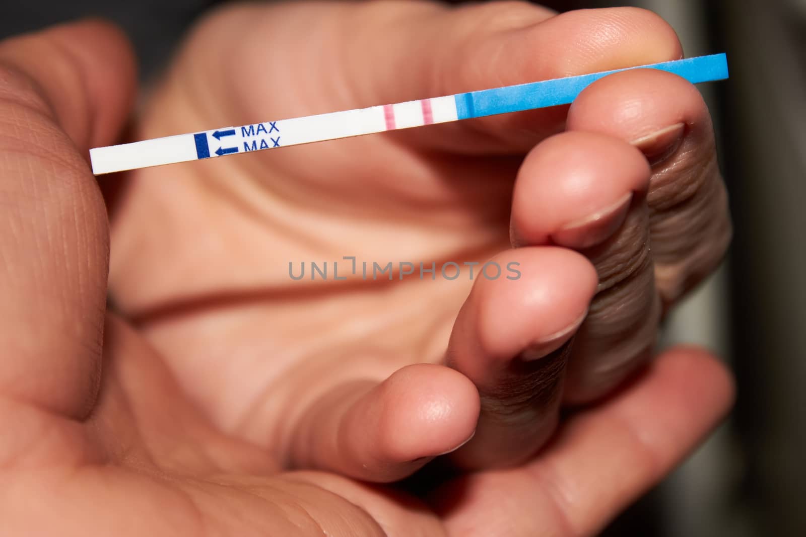 Woman holding pregnancy test, New life and new family concept. Shallow dof