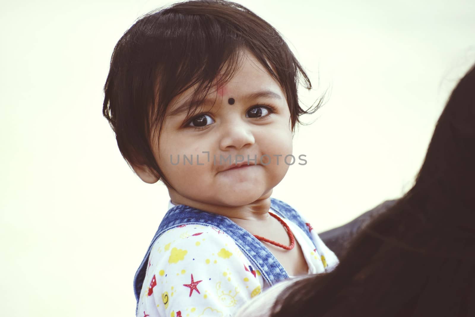 A cute Baby Girl in Joy Mood by ravindrabhu165165@gmail.com